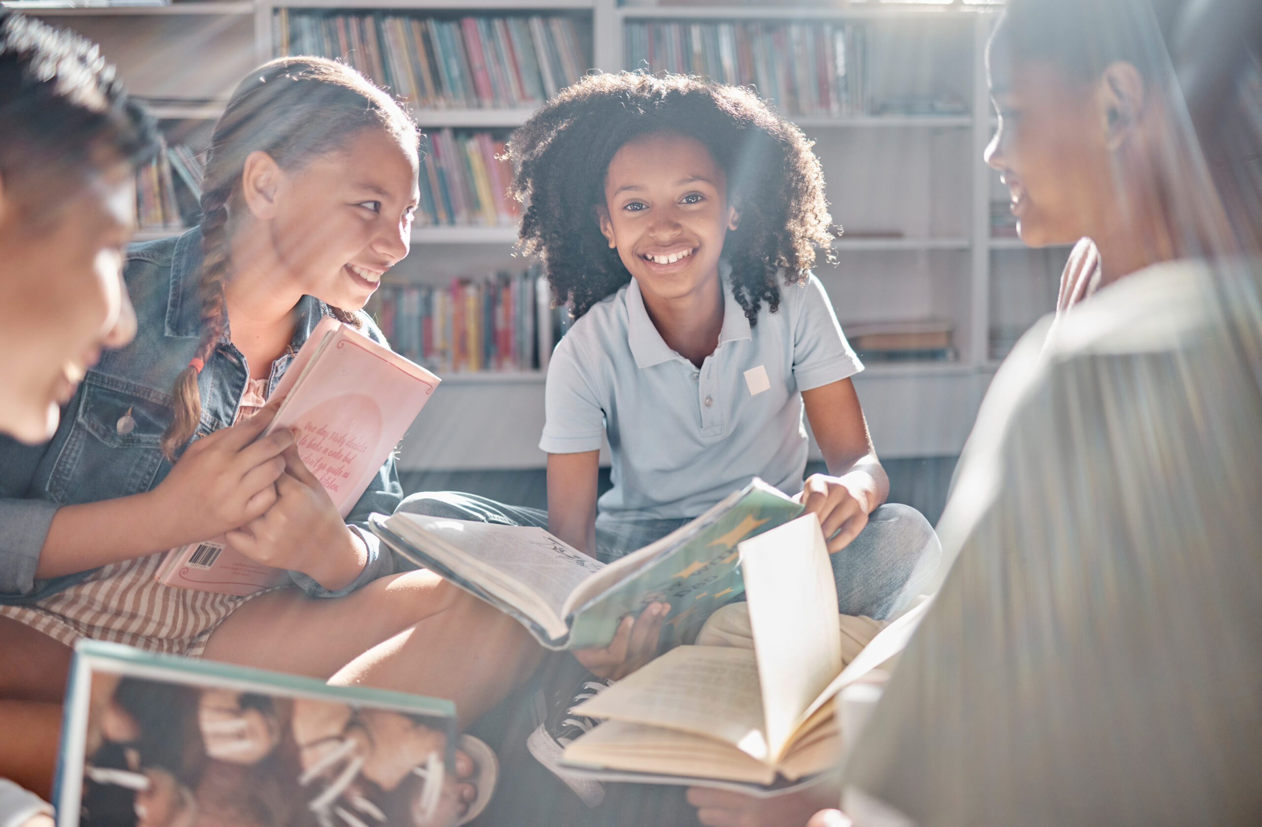 Books, storytelling or excited students reading in library for learning development or youth group growth. Smile, portrait or happy children with funny kids stories for education in school classroom